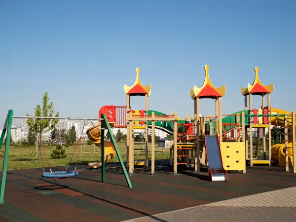 Safe and joyful space with play equipment for kids to enjoy.